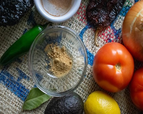 Fresh vegetables and traditional Mexican ingredients on a table